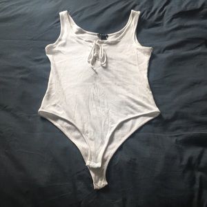 White body suit, size L